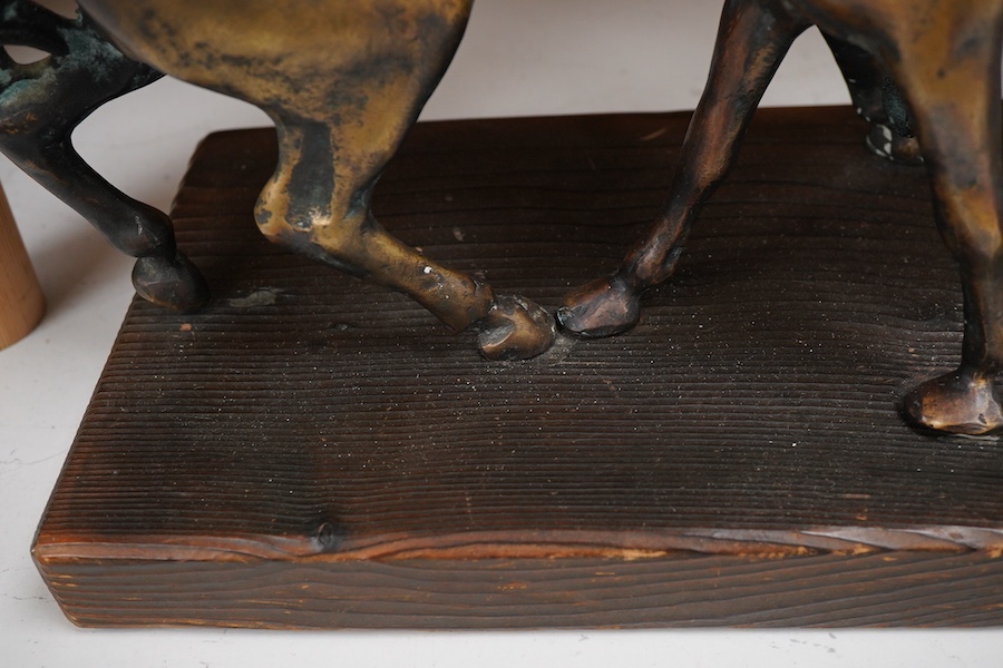 A Romanian bronze of two horses, 45cm wide